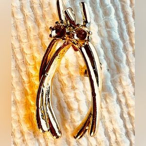 Vintage wishbone brooch in a 14K gold plated